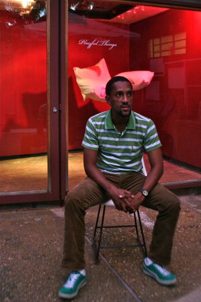 Marlon Darbeau with his “Playful Things” installation at Alice Yard — Erotic Art Week archive photograph