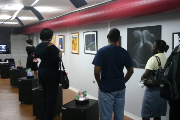 Visitors viewing the gallery at CMB Advertising, 2010 — Erotic Art Week archive photograph